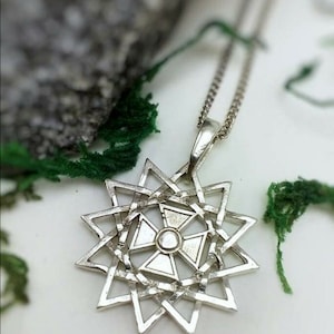 The star of Erzgamma is an ancient amulet with twelve rays Cross pendant Star 12 rays   Bilateral Ertsgamma sacred religious symbol