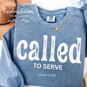 May include: A rustic wooden sign with the text "Welcome to our home" in white lettering. The sign features a distressed finish and a simple, inviting design, perfect for a front porch or entryway.