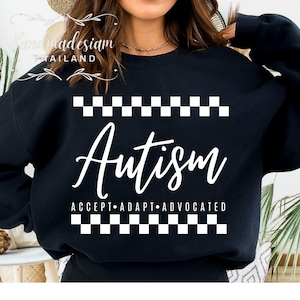 May include: Black sweatshirt with white text that reads "Autism Accept Adapt Advocated" with a checkered pattern above and below the text.