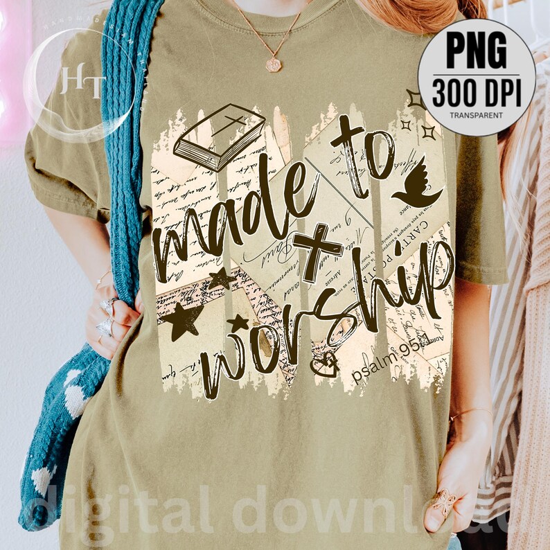 May include: Olive green t-shirt with the words "made to worship" in a distressed font. The design includes a cross, dove, stars, and a book illustration. The text "psalm 95:1" is also visible.