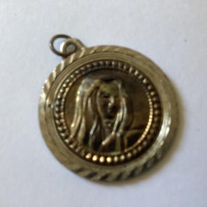 Mary religious pendant