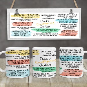 May include: Two white ceramic mugs with black handles. Each mug features a different set of dad jokes printed in colourful text. The text on the mugs includes questions and answers about a variety of topics, such as food, animals, and everyday life.