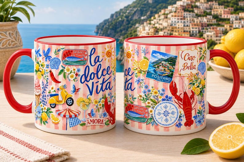 May include: Two ceramic mugs with red handles and rims. The mugs feature a design with Italian imagery, including a yellow scooter, lobster, and the words "la dolce Vita" and "Ciao Bella". The background is a pink and white striped pattern.
