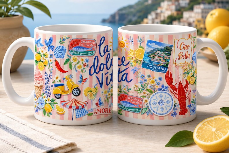 May include: Two white ceramic mugs with a colorful Italian-themed design. The mugs feature illustrations of lemons, a red lobster, a yellow scooter, and the words "la dolce Vita" and "Ciao Bella". The mugs have a pink and white striped background.
