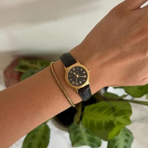 Vintage Damen Schwarz Gold Raymond Weil Leder Quarz Uhr