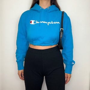 Blue cropped champion hoodie discount