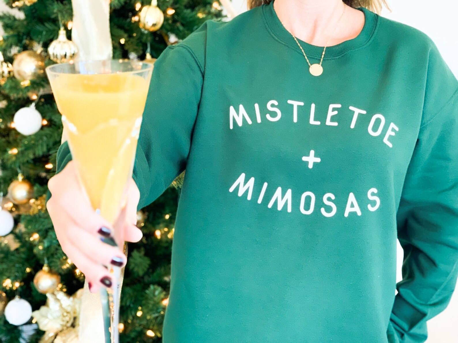 mistletoe and mimosas sweatshirt
