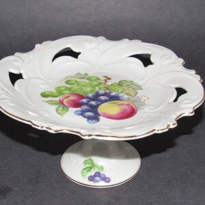 Beautiful Compote with Peaches and Grapes Scalloped edges with gold trim and reticulated