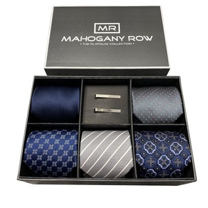 Must-have gift for any man - Classic color combinations make this gift set the perfect compliment for any wardrobe -  5 ties, 2 tie clips