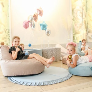 Small floor pouf top