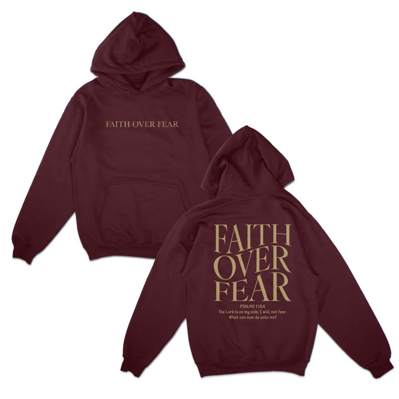 May include: Burgundy hoodie with a large gold print that reads "FAITH OVER FEAR" on the front and a smaller gold print that reads "PSALMS 118:6 The Lord is on my side; I will not fear. What can man do to me?" on the back.