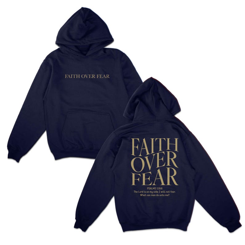 May include: Navy blue hoodie with a large white "FAITH OVER FEAR" graphic on the front and a smaller white "FAITH OVER FEAR" graphic on the back with the text "PSALMS 118:6 The Lord is on my side, I will not fear. What can man do unto me?"