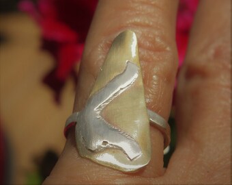 Unique women’s fashion ring made of brass and sterling silver