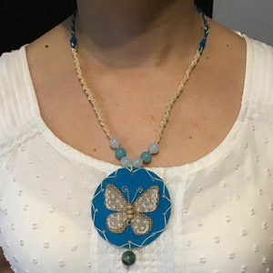 Blauwe vlinder ketting