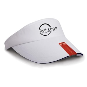 May include: White visor with a curved brim and a navy blue trim. The visor has a red and white logo on the side and a circular logo with the text "Text Logo" and "your tagline here".