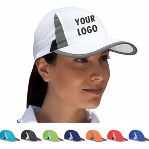 May include: White athletic cap with a grey brim and accents, featuring the text "YOUR LOGO" in black. The cap has a mesh side panel for breathability. Several colour variations of the cap are displayed below.