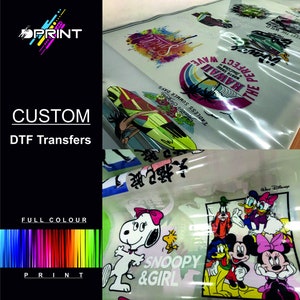 May include: A selection of colourful DTF transfers showcasing various designs, including a surfer, a cartoon dog, and a group of Disney characters. The transfers are printed on clear sheets and are ready to be applied to fabric.