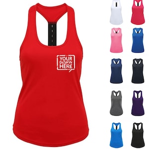 May include: A red racerback vest with a black strap and the text "YOUR DESIGN HERE" in a white box. Additional vests in white, pink, blue, navy, black, grey, and purple are displayed.
