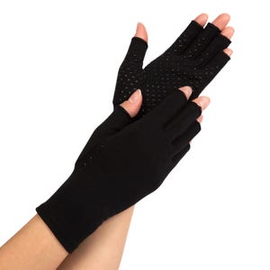 May include: Black fingerless gloves with a textured grip on the palm. The gloves cover the hand up to the knuckles and wrist. The gloves are made of a soft, stretchy material.