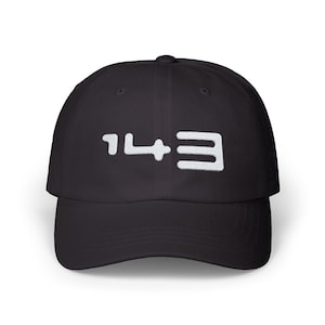 May include: A black baseball cap with a white embroidered design that says "143".