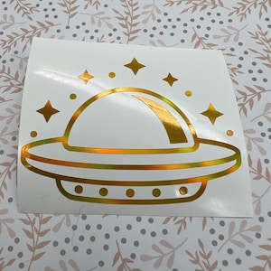 Etiqueta engomada holográfica o brillante de la calcomanía OVNI, taza, teléfono, computadora portátil, taza, computadora, coche, botella de agua, controlador, nave espacial alienígena, vaso, refrigerador