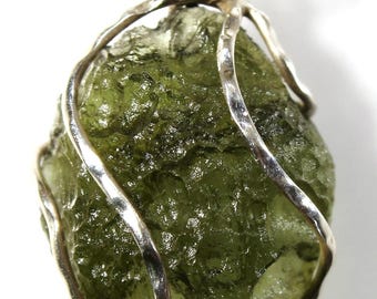Pendant - real Czech moldavite from locality &quot;Chlum - 2020&quot; in a silver cage, 1.84grams, stone size 16x13x4 mm, yellowish green color (1085)