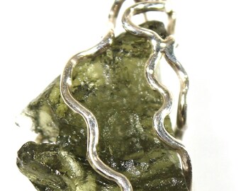 Pendant! Genuine Czech moldavite from locality CHLUM 2021, in a silver(Ag 925) cage, 1.58gram, stone size 16x10x6mm, yellowish green