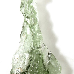 Natural Czech moldavite from locality CHLUM - year 2023, 0.88 grams, 27x14x4 mm, very nice light yellowish green color (code:32/47)
