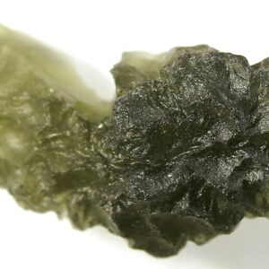 Interesting natural Czech moldavite  Brusná, finding in 2016, 3.78grams, 29x14x12mm, nice yellowish green, deep structure, nice shape (1869)