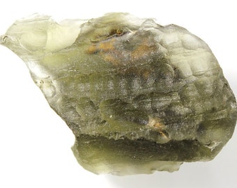 Natural moldavite from "Chlum 2020". A unique piece with fossilized clay and ferrolite, 26x18x9.5mm, 3.48grams