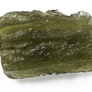 Natural Czech moldavite from locality CHLUM - year 2023, 1.44 grams, 18x12x5 mm, yellowish green color, nice shape (code: 8/47)