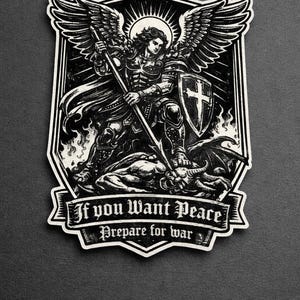 May include: Black and white sticker featuring an illustration of an angel with large wings, holding a spear and shield, standing over a defeated demon. The text reads "If you Want Peace Prepare for War."