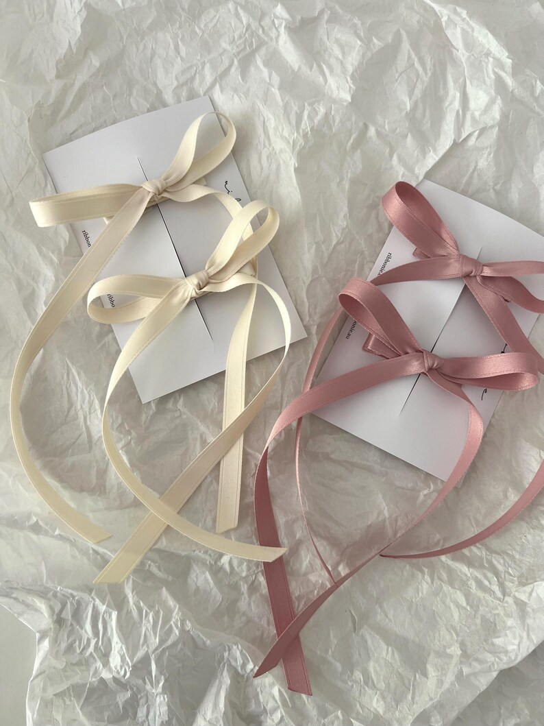 set of two satin long tail bows for pig tail hair style