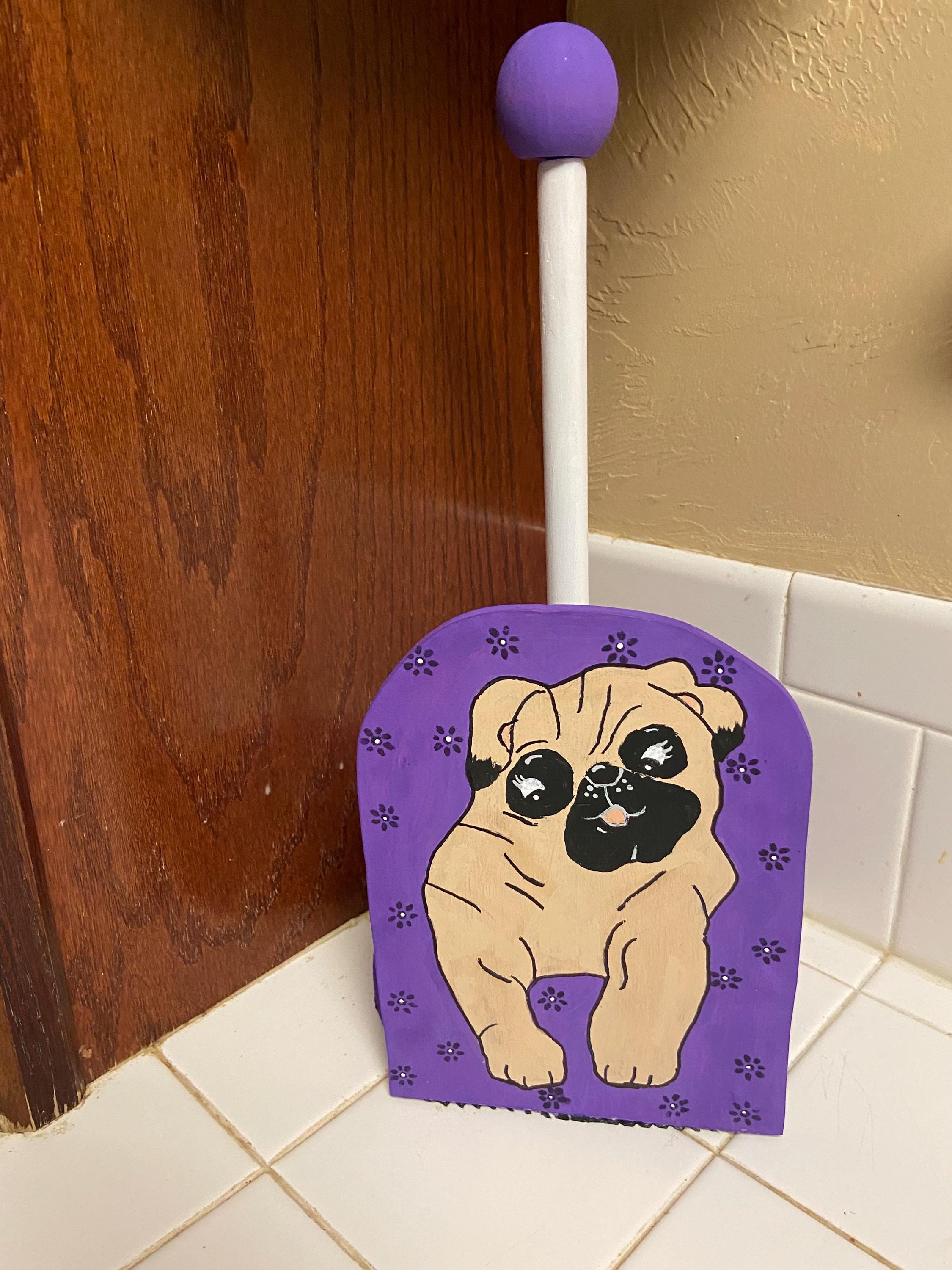 Un grazioso porta carta igienica da parete a forma di cane, un