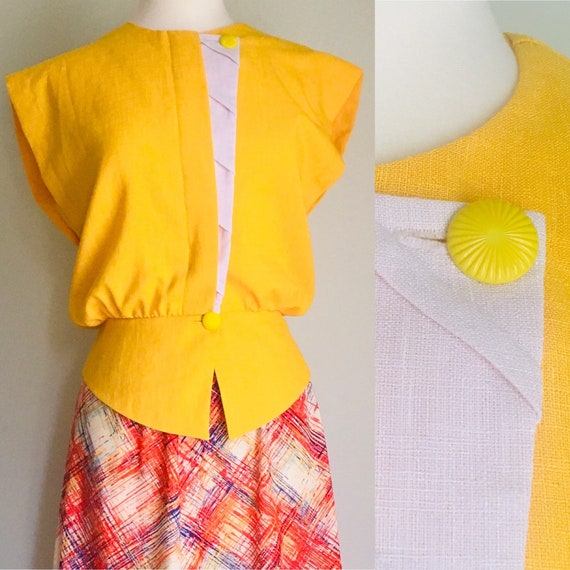 Yellow and white cinched waist cross heart 1980’s