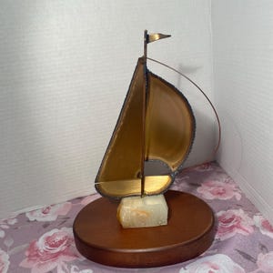 Vintage John DeMott Brass Sailboat Sculpture on a Stone Base.