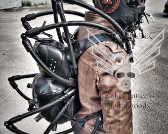 May include: A black leather steampunk backpack with a spider-like design. The backpack has multiple black tubes and metal accents. The backpack is being worn by a person wearing a brown leather jacket and blue jeans.