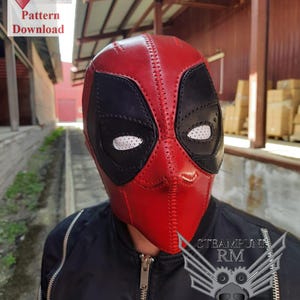May include: A red and black leather Deadpool mask with a stitched design. The mask has a white mesh over the eyes. The mask is being worn by a person wearing a black jacket with silver zippers. The image includes the text "STEAMPUNK RM" and "Leather patterns Digital goods".