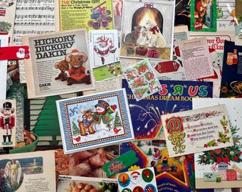 May include: A collage of vintage Christmas ephemera, including advertisements, greeting cards, and stickers. Featured items include a "Hickory Dickory Dakin" ad, a snowman and reindeer card, and a Toys R Us Christmas Dream Book.