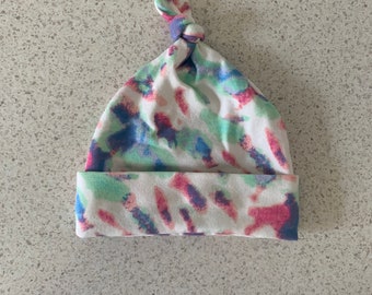 tegan baby hat with top knot