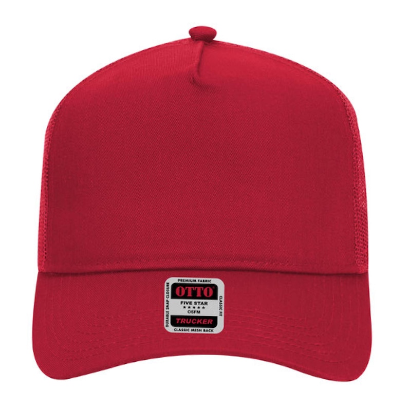 May include: A red trucker hat with a mesh back and a snap closure. The hat features a classic fit and a small rectangular tag with the text "OTTO" and "TRUCKER".