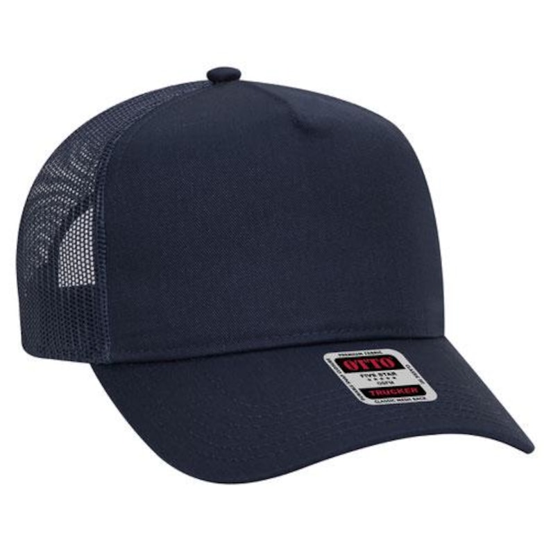 May include: A navy blue trucker hat with a mesh back panel. The hat has a curved brim and a white label with the text "OTTO FIVE STAR TRUCKER" in red.