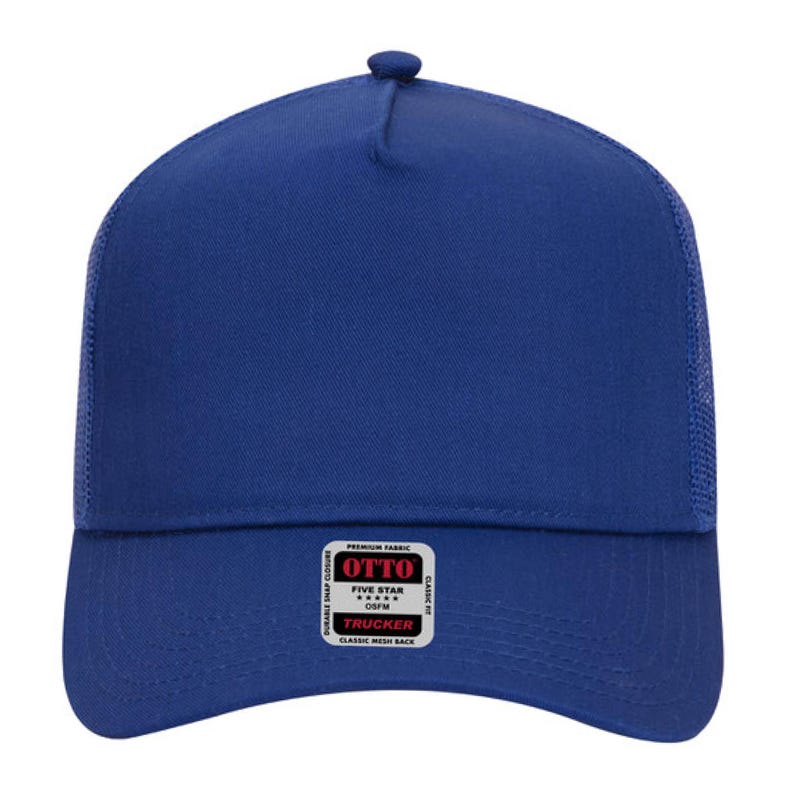 May include: A royal blue trucker hat with a mesh back and a snap closure. The hat features a curved brim and a small, round button on top. A white label with black text reads "OTTO" and "TRUCKER".