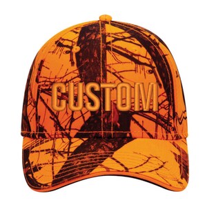 May include: An orange and brown camouflage baseball cap with the word "CUSTOM" embroidered across the front. The cap features a curved brim and a structured crown, suitable for outdoor activities.