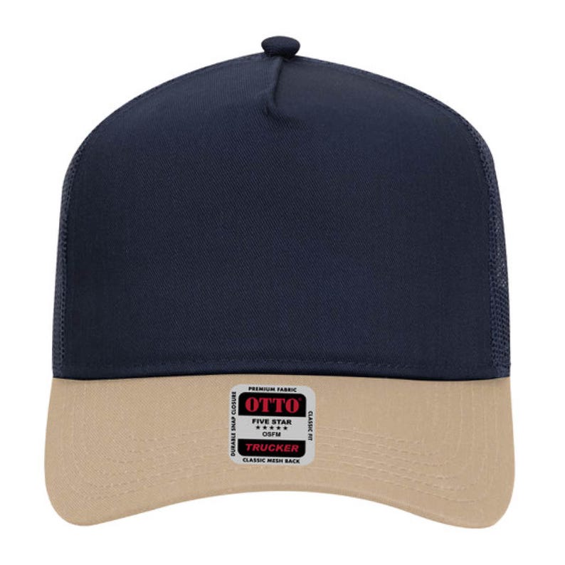 May include: A navy blue and tan trucker hat with a mesh back. The hat features a curved brim and a snap closure. The front of the hat has a patch with the text "OTTO" and "TRUCKER".
