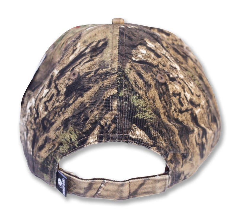 May include: A camouflage baseball cap with a curved brim. The cap features a brown, green, and tan pattern, with a small tag on the back. The cap is designed for outdoor activities and hunting.