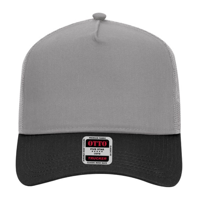 May include: A gray and black trucker hat with a mesh back. The hat features a gray front panel and a black brim. A rectangular patch on the front reads "OTTO TRUCKER CLASSIC MESH BACK".