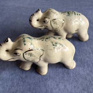 Preowned  lot of two ceramic beautiful elephant figurines