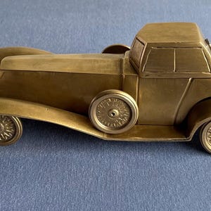 Unique preowned brass Rolls Roycee modle car