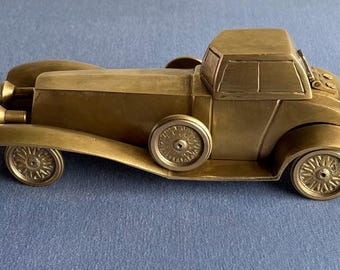 Unique preowned brass Rolls Roycee modle car